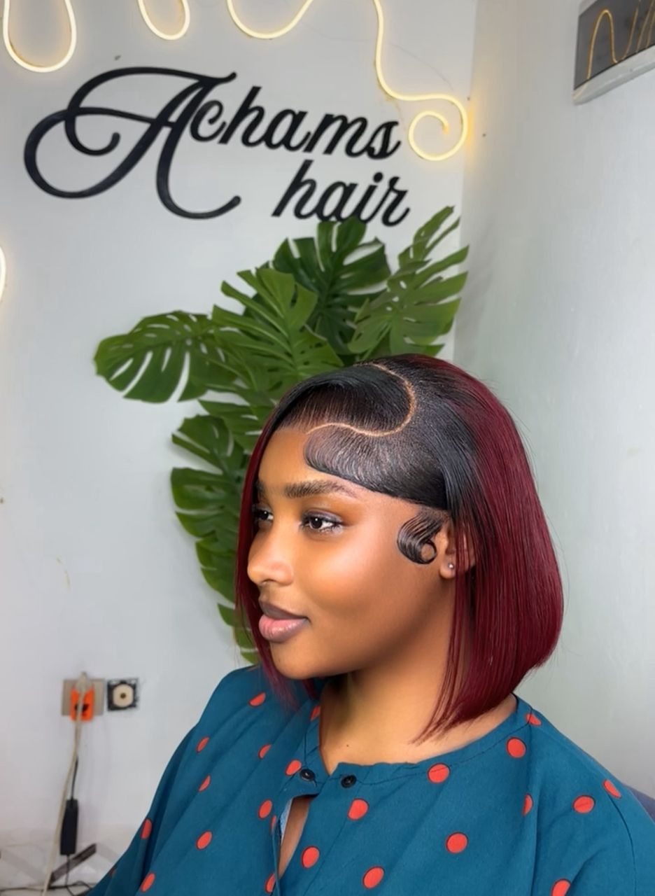 Model wearing a glueless HD lace front human hair wig by Achams Hair Cameroon